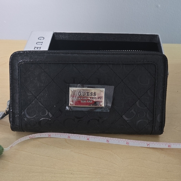 Guess Handbags - NWT GUESS Quilted Black Wallet